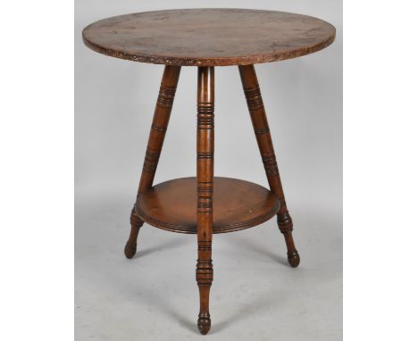 An Edwardian Circular Walnut Occasional Table with Stretcher Shelf, 55cm Diameter 