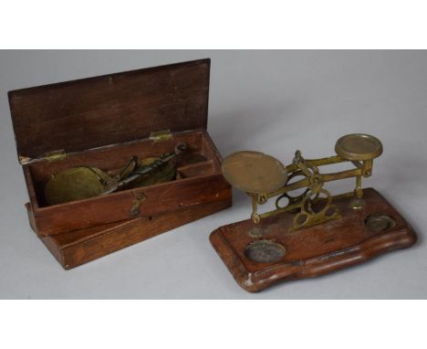 A Small Set of Postage Scales on Mahogany Base, (Missing Weights) together with a Mahogany Cased Set of Pan Scales and a Box 