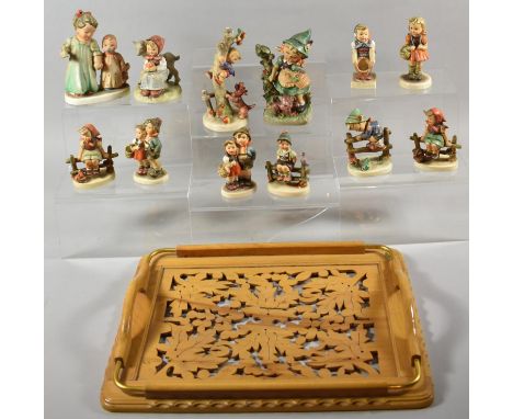A Collection of Goebel and Other Continental Ornaments of Children on Pierced Tray 