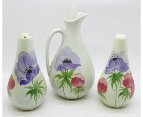 A hand painted condiment set; salt, pepper and oil/vinegar, possibly E Radford 