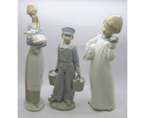 Three figures; two Lladro and one Nao 