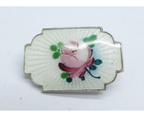 A small Norwegian sterling silver enamel rose brooch 
