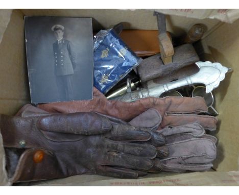 Assorted items including military buttons, a silver Moroccan dagger, a company stamp, an oil can, two pairs of gloves, etc. *