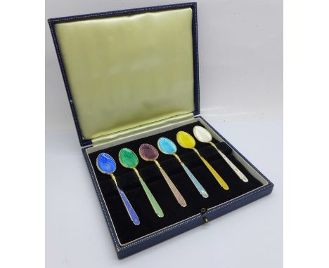 A cased set of six silver and enamel coffee spoons, one a/f, 76g 