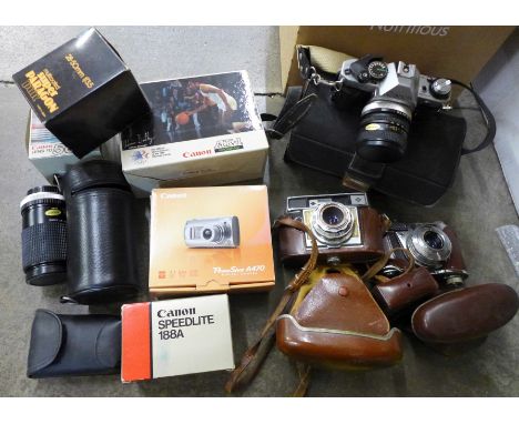 A Canon AE-1 camera with box and other camera equipment, a Printflex Zoom lens, other lenses and two field binoculars (includ