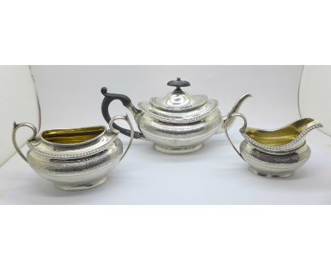 A three piece silver tea service, London 1878, 604g 