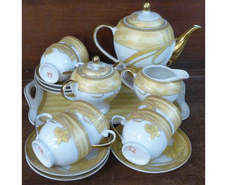 A Chinese six setting tea service with tray, marked Canton 