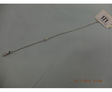 A 14ct white gold opal pendant on a 9ct white gold chain