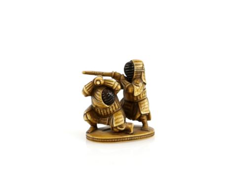 A stained ivory netsuke of two Kendo exponents, both wearing Men and Kote, two kanji on the base, 20th CenturyProvenance: The