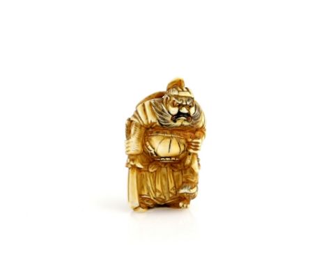 An ivory netsuke of Shoki with an Oni, un-signed, 19th or 20th CenturyProvenance: The Property of a Lady. From a Private Coll