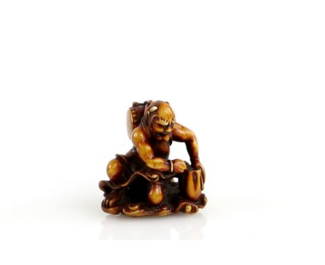 A stained ivory netsuke carved as Raijin on a cloud, 20th CenturyProvenance: The Property of a Lady. From a Private Collectio