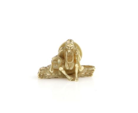 A stained ivory netsuke of an old women, seated on a log from the Rojo-mono play of the Noh Drama, Sotoba Komachi; un-signed,