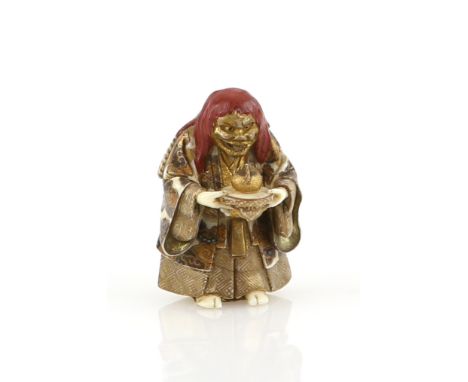 A lacquered ivory netsuke of a red-haired actor, holding a jewel, 20th CenturyProvenance: The Property of a Lady. From a Priv