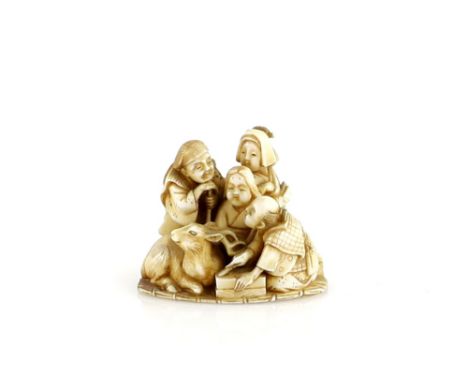 An ivory netsuke of Okame at the centre of a family group with a recumbent deer, Meiji PeriodProvenance: The Property of a La