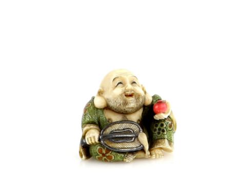 A Yasuaki (Homei) School coloured ivory netsuke of Hotei, seated with a fan and hossu in his right hand , signed YasuakiProve