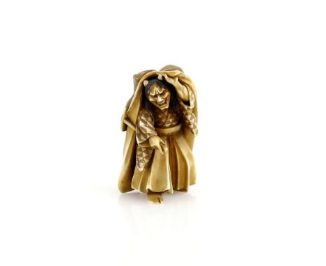 A small lacquered ivory okimono of a Noh, or other theatre, performer in the role of Hannya; signed JugyokuProvenance: The Pr