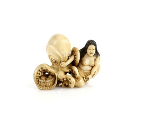 A stained ivory okimono of a seated Ama next to a large octopus with a basket of shells, 7.5 cm wide, 19th or 20th CenturyPro