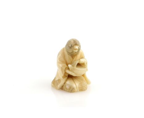 A stained ivory netsuke of a sparrow holding a teapot, 19th or 20th CenturyProvenance: The Property of a Lady. From a Private