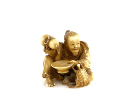 A stained ivory netsuke of a man pouring from a gourd flask whilst seated beside a minogame or turtle; probably Urashima Taro