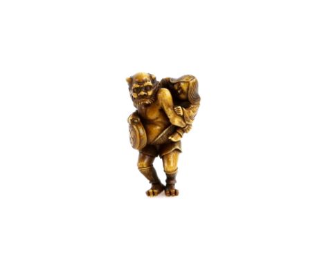 A stained ivory netsuke of an Oni carrying Okame on his back, signed TomoyukiProvenance: The Property of a Lady. From a Priva