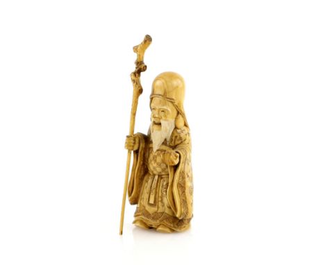 A small ivory okimono of Jurojin, holding a gnarled staff in his right hand, unsigned; the staff 9.5 cm high,  Meiji Period o