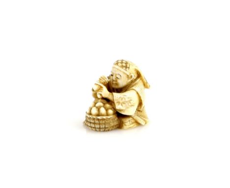 An ivory netsuke of a seated egg-tester, signed KogyokuProvenance: The Property of a Lady. From a Private Collection acquired