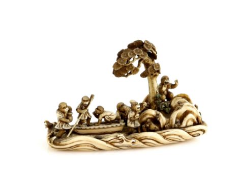 A stained ivory okimono carved as a group of monkeys at the shoreline with a punt, 12.5 cm long, 19th or 20th CenturyProvenan