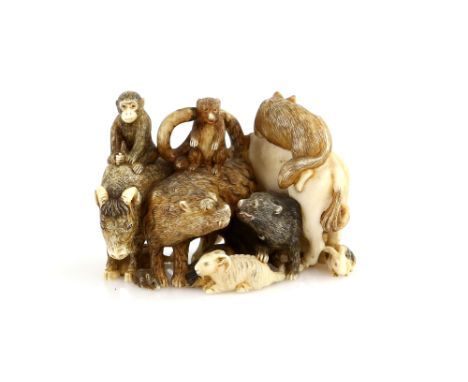 A stained ivory okimono carved as the Twelve Animals of The Zodiac, 7.5 cm wide, late 19th or 20th CenturyProvenance: The Pro