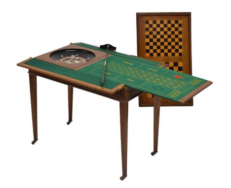 Early 20th century oak games table, the removable rectangular top inlaid with two chessboards to the reverse, over hinged bai