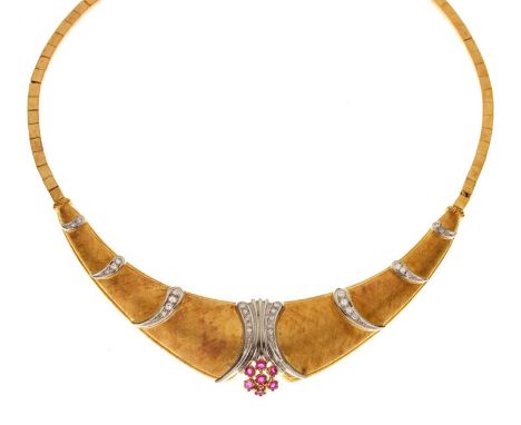 Ruby and diamond 18ct yellow and white gold set collar necklace, the central ruby flower head cluster formed of seven small r