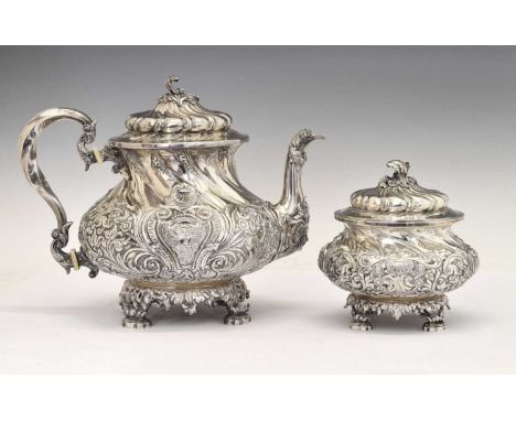 Early 20th century Portuguese two-piece 916 standard white metal tea set comprising teapot (24.5cm high) and tea caddy, Lisbo