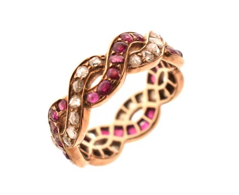 Ruby and diamond crossover full eternity ring, one band set with rose cut diamonds, the other rubies, unmarked yellow metal, 