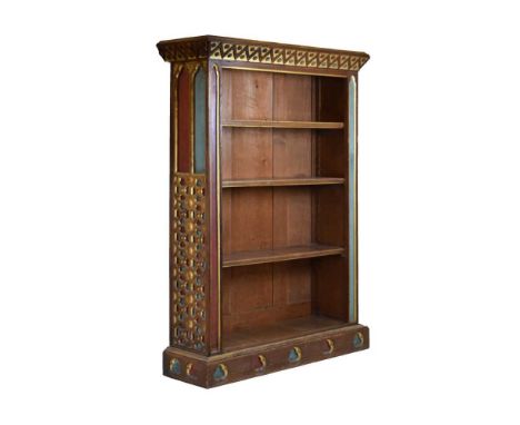 Victorian Gothic revival carved oak and polychrome bookcase, the rectangular moulded top over angled frieze with geometric ca