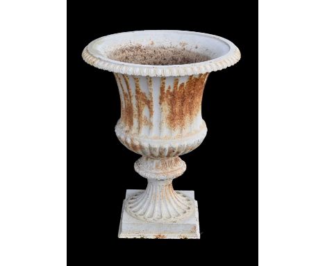 Victorian cast iron garden urn, of fluted campana form on plinth base, 63cm x 78cm high overall