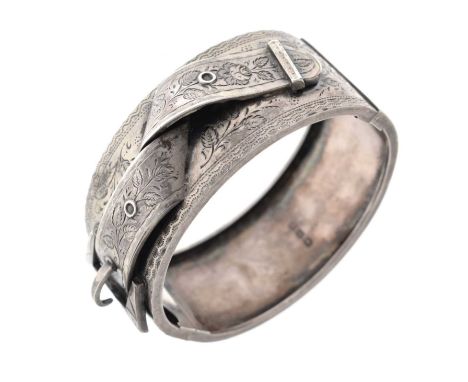 Late Victorian West's Patent silver cuff bangle, with engaved folded belt decoration, stamped 'WEST'S PATENT', William Warr, 