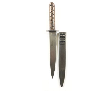 WW1 / WW2 Italian Fighting Knife.  A good example with an eight inch spear point blade. To the forte a man holding a bow and 