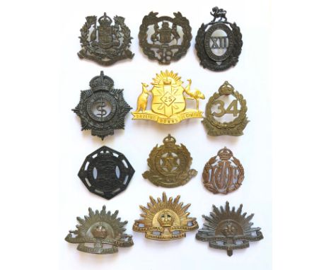 12 Australian slouch hat / head-dress badges.  20th Light Horse V.M.R ... 38th Bendico Regiment ... 12th Battalion Launston R