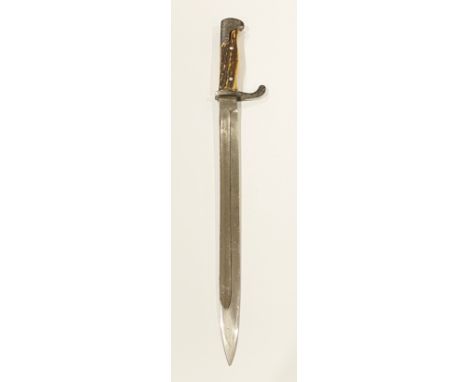 WW1 German 1915 Parade Bayonet This example with a straight 14 inch blade the back edge dated 1915. The hilt with stag horn g