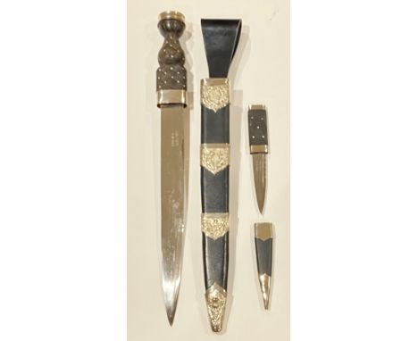 Scottish. 1983 military issue Piper dirk and Skein Dhu. Dirk with plain plated 12 inch blade etched 135-7275 over Broad Arrow