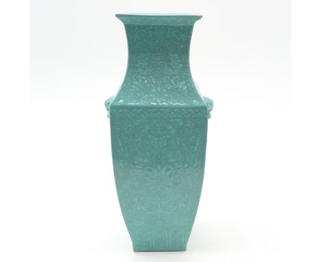 Raised decor in light green, figural handles, marked on bottom with seal mark, 42 cm. tall. 