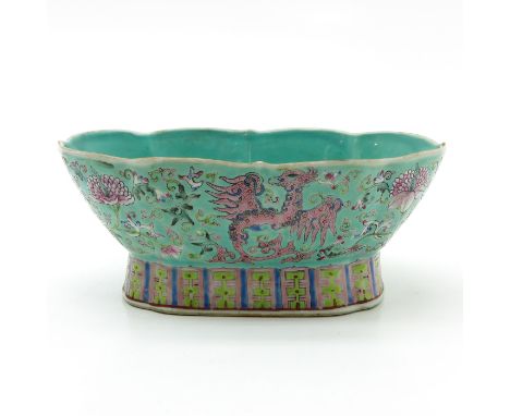 Light green ground with Famille Rose enamels, 24 x 18 x 9 cm.