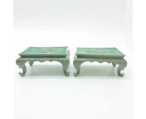 Light green ground with floral decor, 23 x 16 x 10 cm., one leg restored.