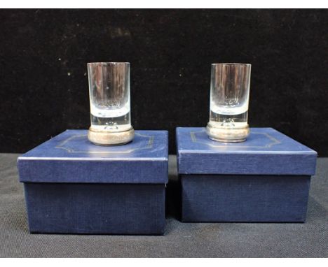 TWO SILVER MOUNTED VODKA GLASSES 
