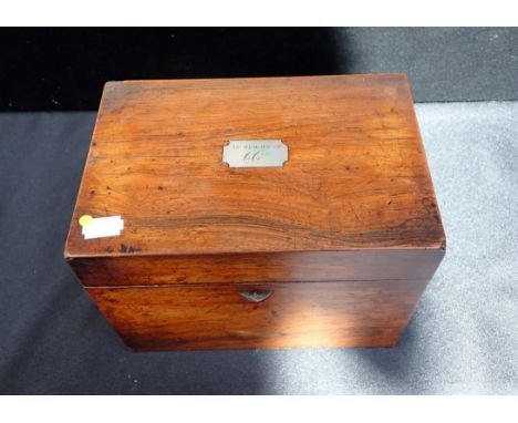 A 19TH CENTURY ROSEWOOD TEA CADDY with fitted interior, and cartouche 'In memory of CC' (some damage)