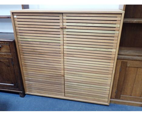 A LIGHT OAK 'MAX' DINING ROOM CUPBOARD, BY HABITAT with assembly instructions 122cm wide