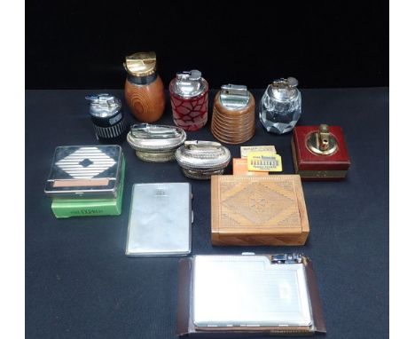 A COLLECTION OF TABLE CIGARETTE LIGHTERS Ronson, Colibri and others, vintage glass and silver-plated examples, with other smo