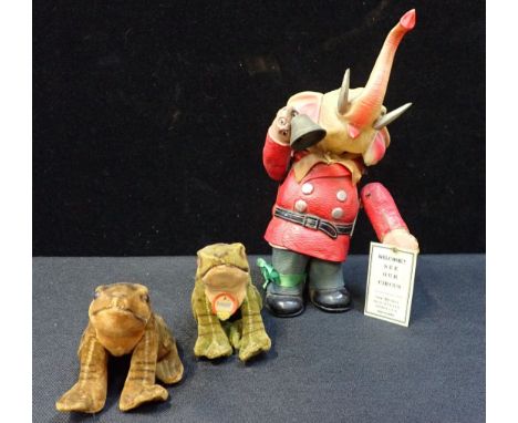 A CELLULOID JAPANESE ELEPHANT with label 'Welcome see our Circus' (damaged to arm fixing) and two Steiff velvet frogs