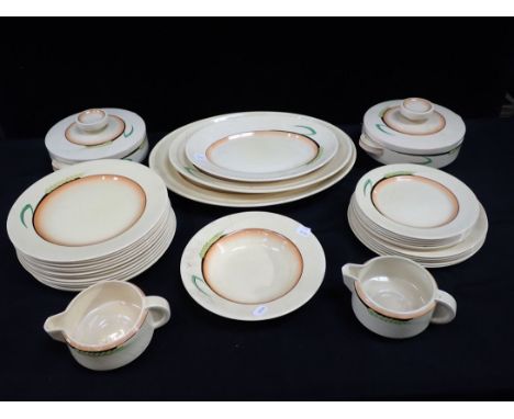 CLARICE CLIFF BIZARRE: BEIGE WHEAT for Wilkinson to include dinner plates, oval plates, tureens and other items (some damage)