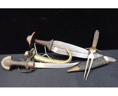 A TURKISH CURVED KNIFE in a brass sheath, with another knife and a cased fork