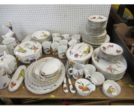 A large collection of Royal Worcester Evesham pattern, to include mugs, tea cups, saucers, side plates, dinner plates, oval p